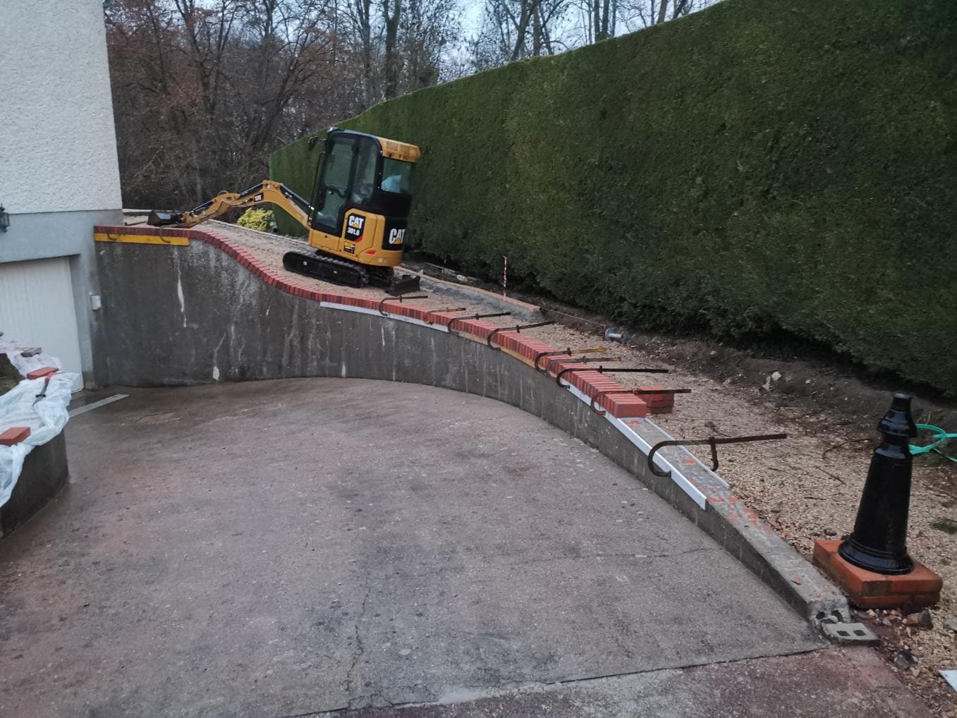 Aménagement extérieur - Habillage descente escalier en briques
